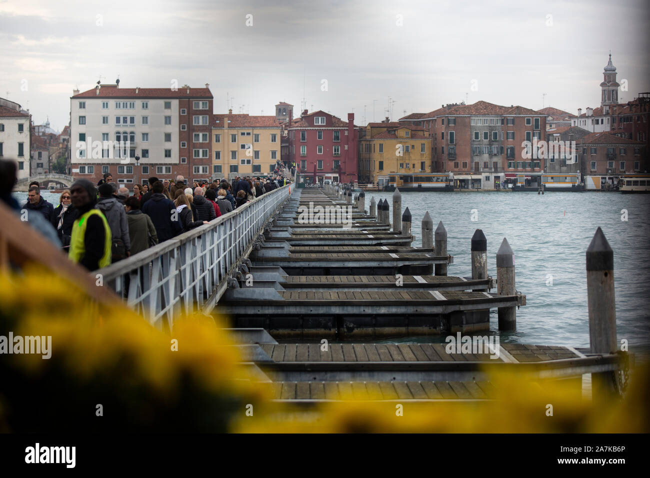Venice all saints celebration, the boat bridge from fondamenta nuove to San Michele cementery Isle Stock Photo