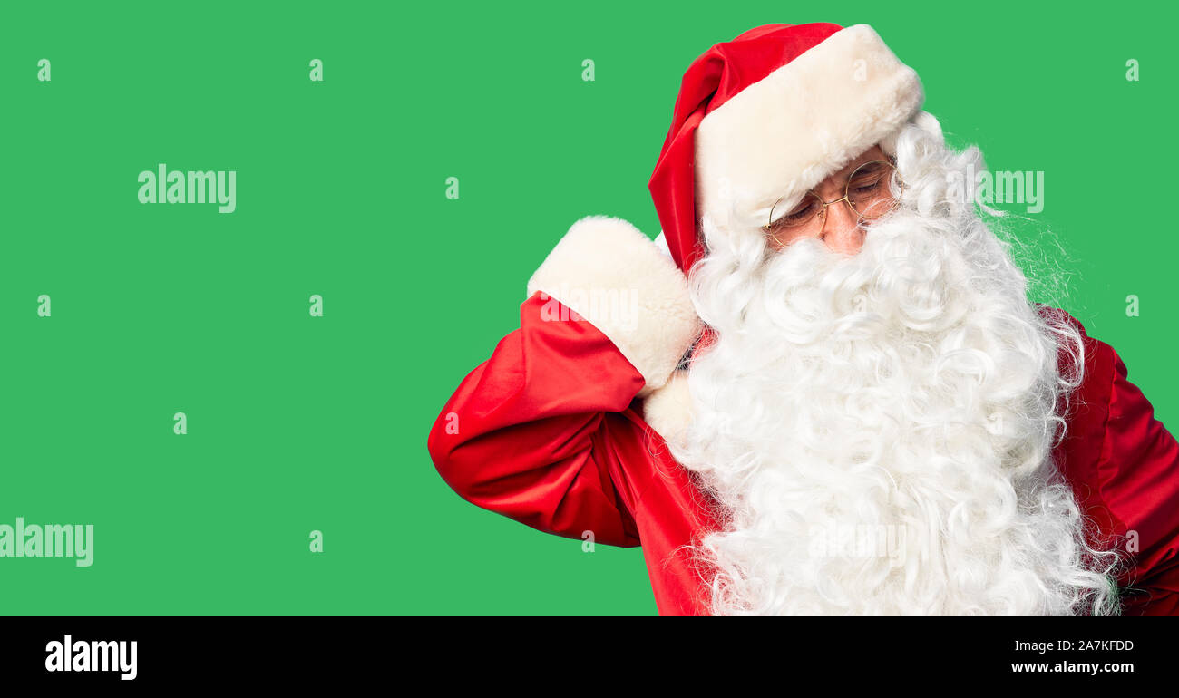 Middle Age Handsome Man Wearing Santa Claus Costume And Beard Standing Suffering Of Neck Ache Injury Touching Neck With Hand Muscular Pain Stock Photo Alamy