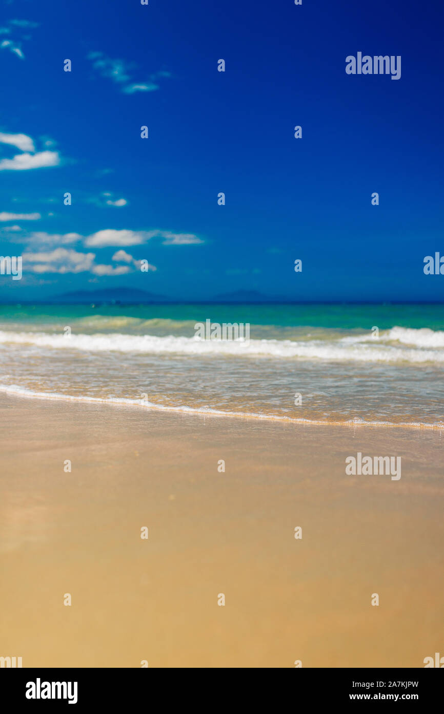 Empty sand beach with blue sea and blue sky background. Summer Vacation ...