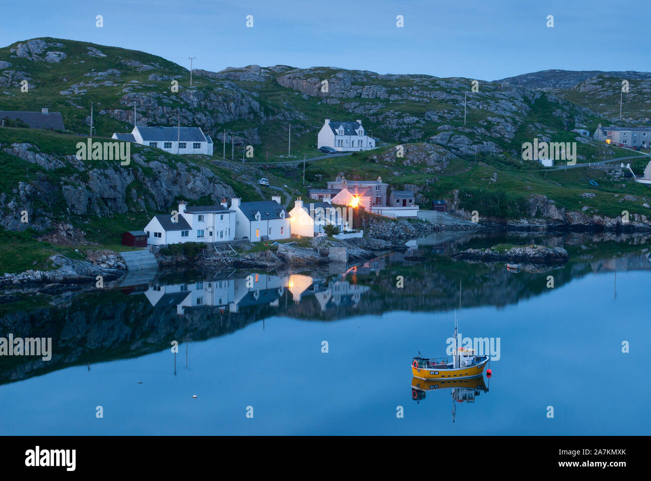 Fishing village at twilight, Scalpay, Isle of Harris, Outer Hebrides, Scotland, UK. Stock Photo