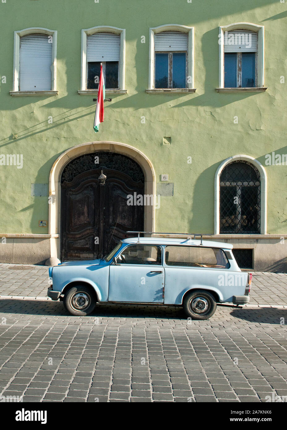 Trabant car outside building on Diz ter (Parade Square) of Old Town Budapest in the Castle District Stock Photo