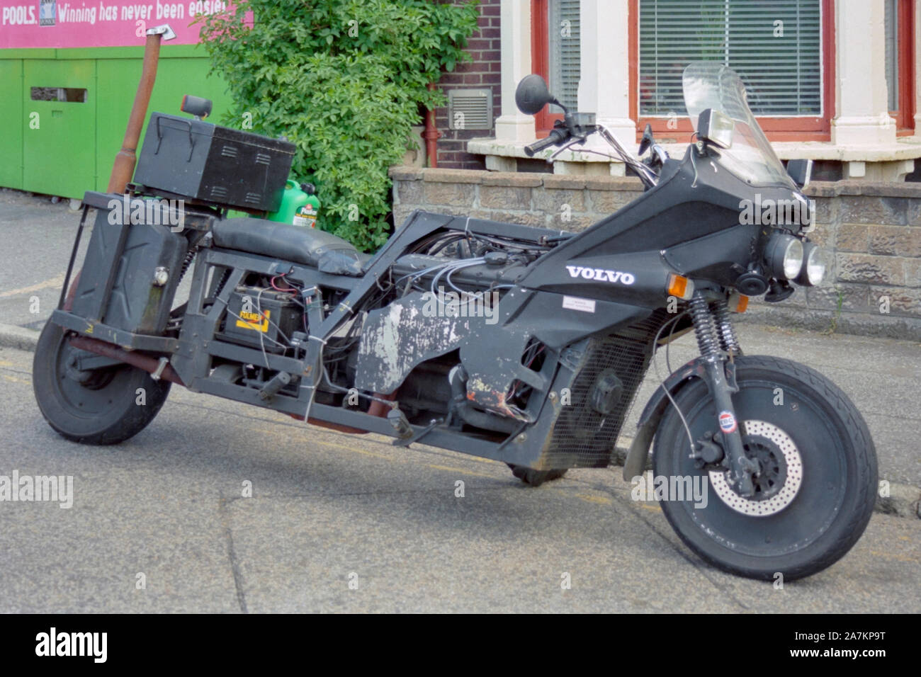 odd looking custom built motorbike at a rally organised by motorcycle action group outside of the now defunct air balloon pub portsmouth 1990s Stock Photo