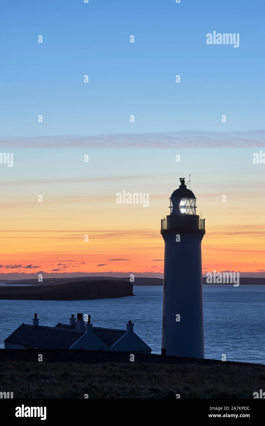 Cantick Head lighthouse on South Walls, Orkney, Scotland.  On the southern approaches to Scapa Flow at sunrise Stock Photo
