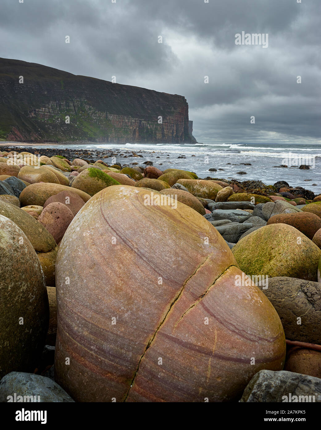 Patterned boulders on Rackwick Bay beach, Hoy, Orkney, Scotland Stock Photo