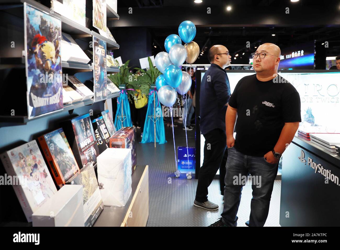 FILE--A young boy plays electronic games on an XBOX ONE game console at a  physical store of Microsoft in Shanghai, China, 26 December 2014. Produc  Stock Photo - Alamy