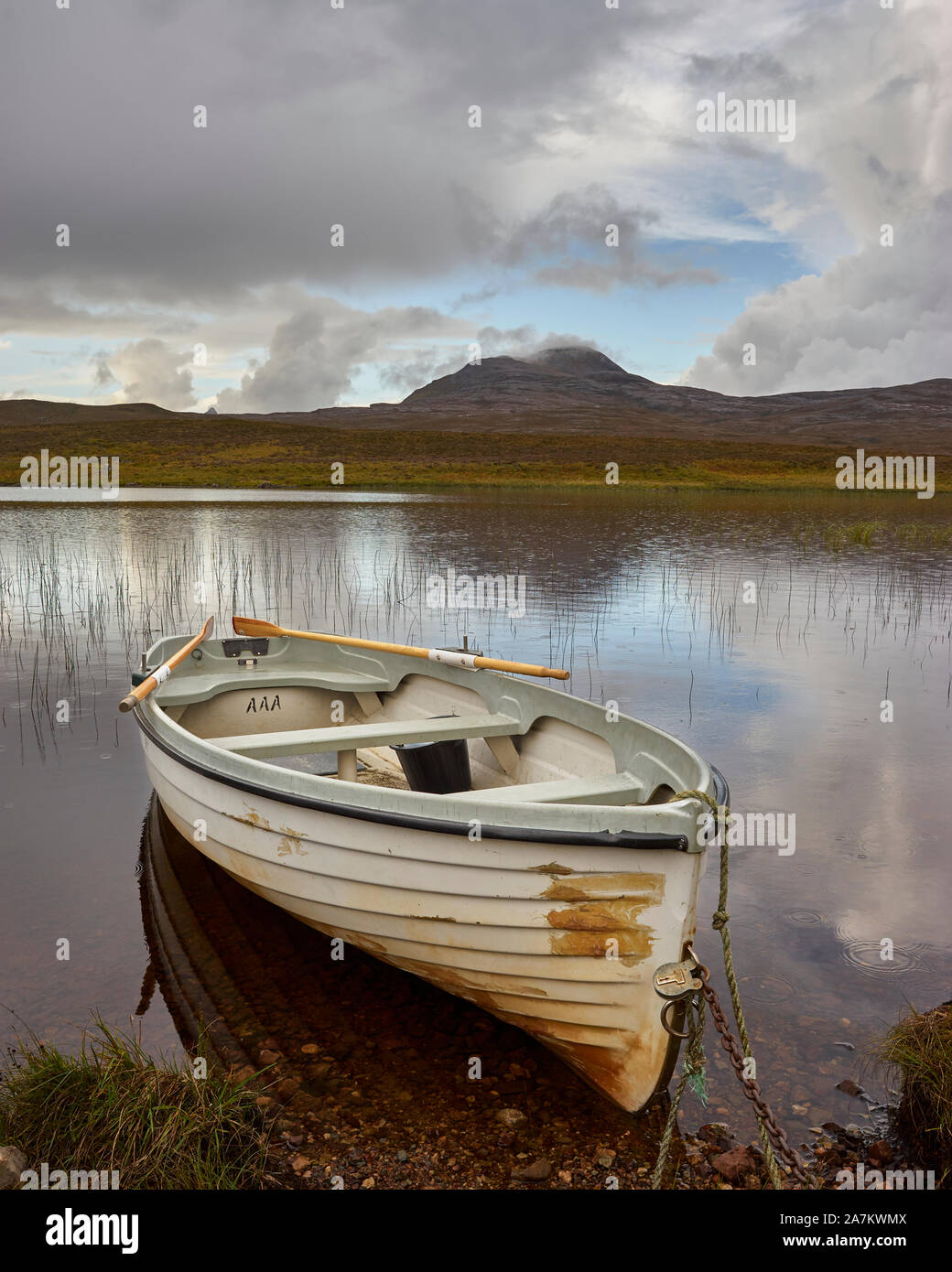 Rowing boat and Loch Awe with Canisp behind, Assynt, Sutherland