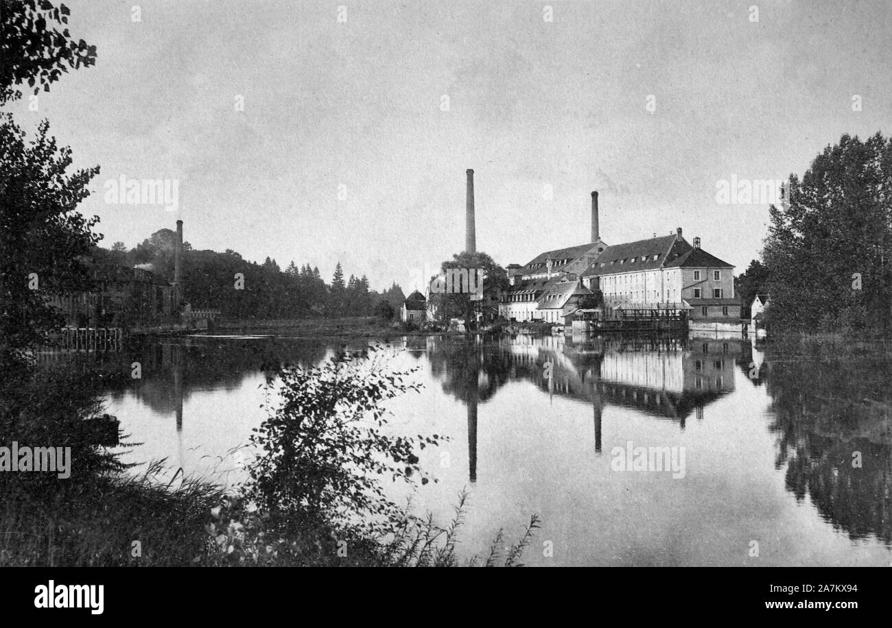 Old postcard image (c. early 1900s) of factories at Audincourt, Doubs, France Stock Photo