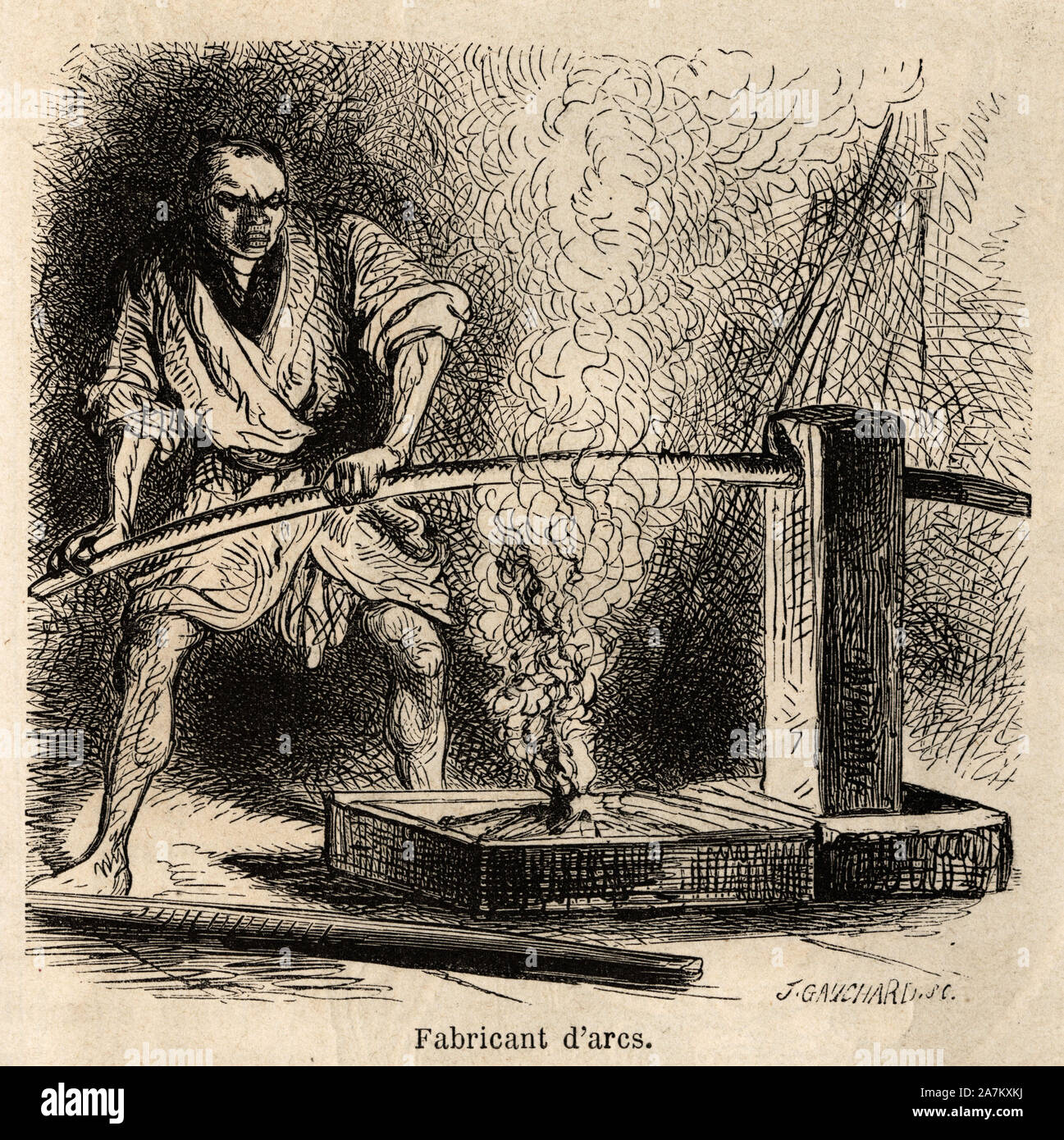 Le fabricant d'arcs dans son atelier, expose un instant le bois a la flamme d'un feu de copeaux, pour leur donner le pli necessaire de leur courbure. Stock Photo