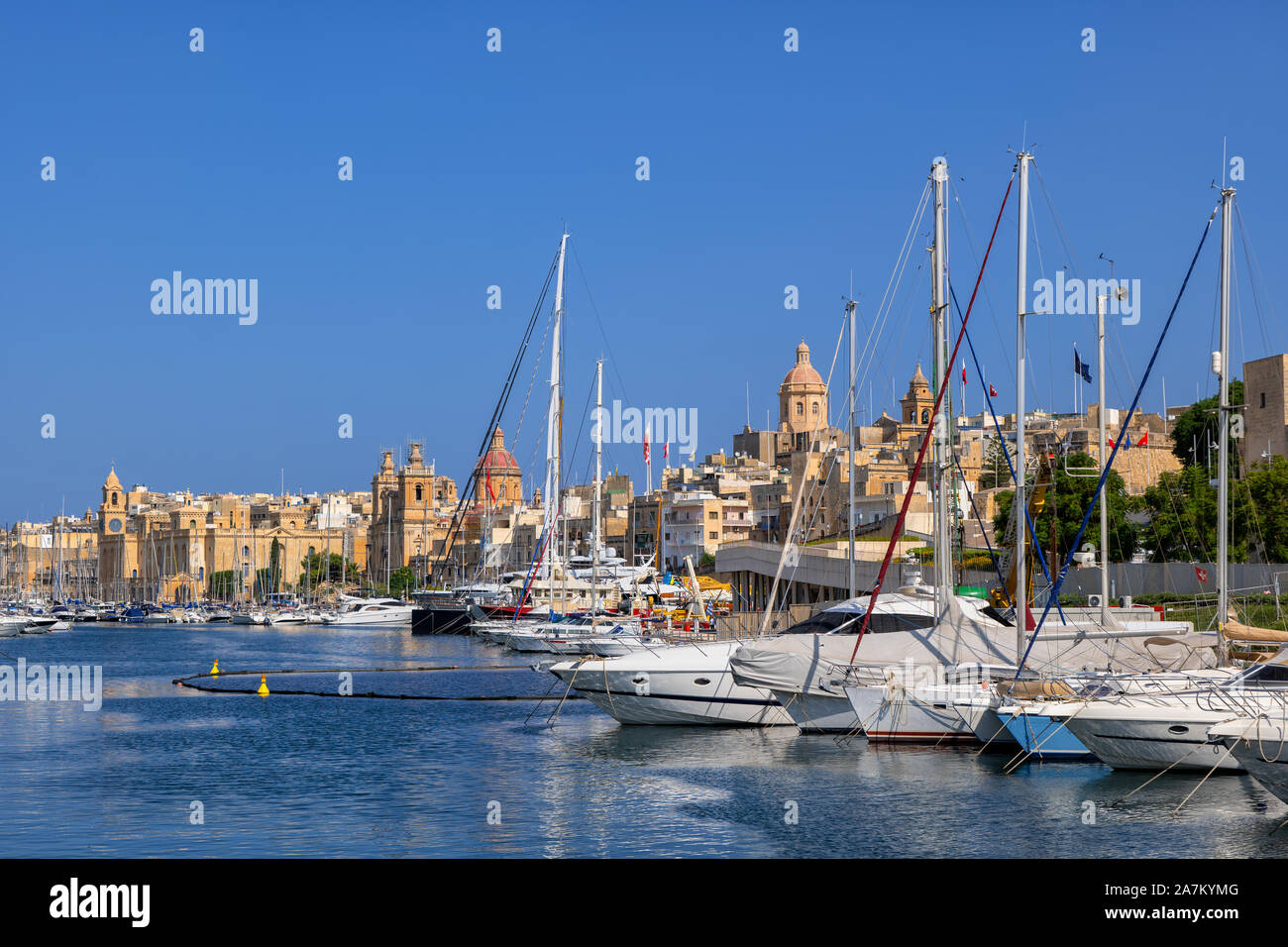 City of Vittoriosa - Birgu in Malta, yacht marina in the Grand Harbour and city skyline. Stock Photo