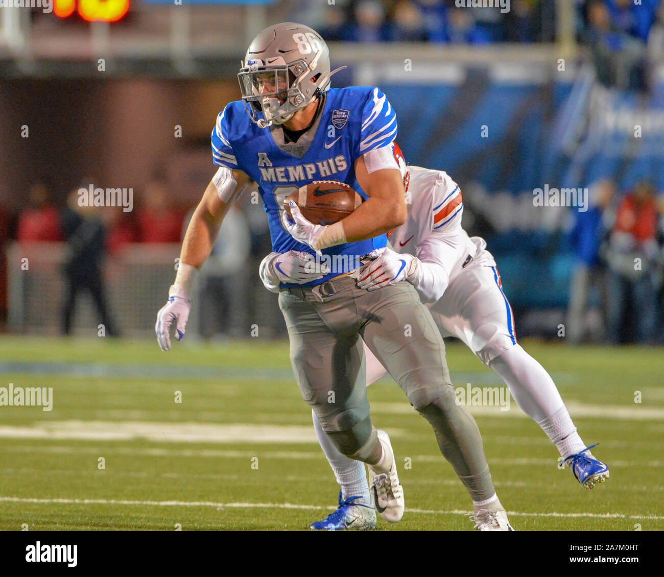 November 02, 2019: Memphis tight end, Joey Magnifico (86), runs the ball as the SMU defense tries to pull him down, during the NCAA football game between the SMU Mustangs and the Memphis Tigers at Liberty Bowl Stadium in Memphis, TN. Kevin Langley/Sports South Media/CSM Stock Photo