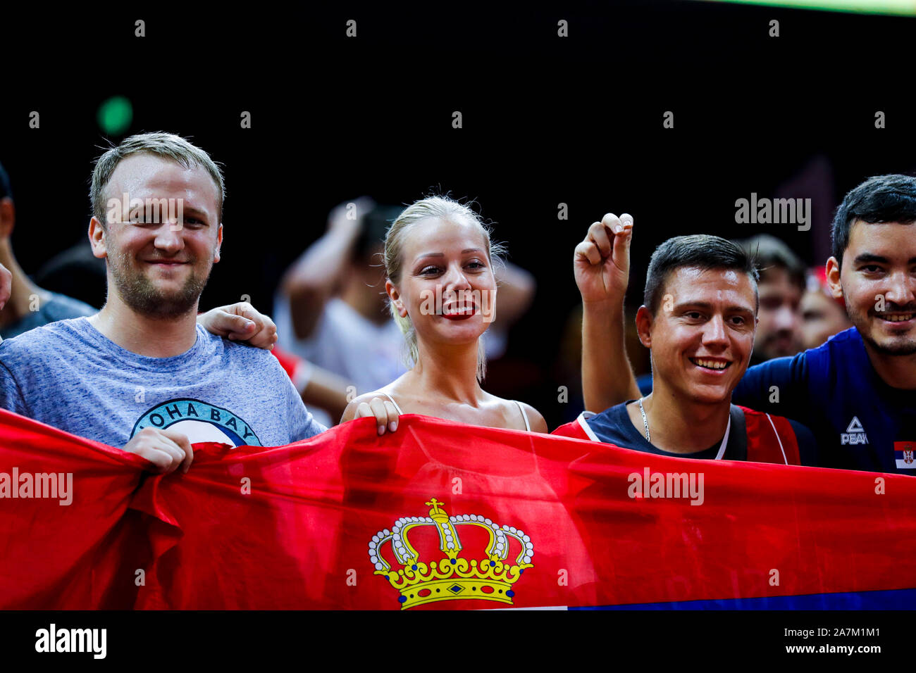 Serbian fans cheer for the Serbian National Basketball Team at the