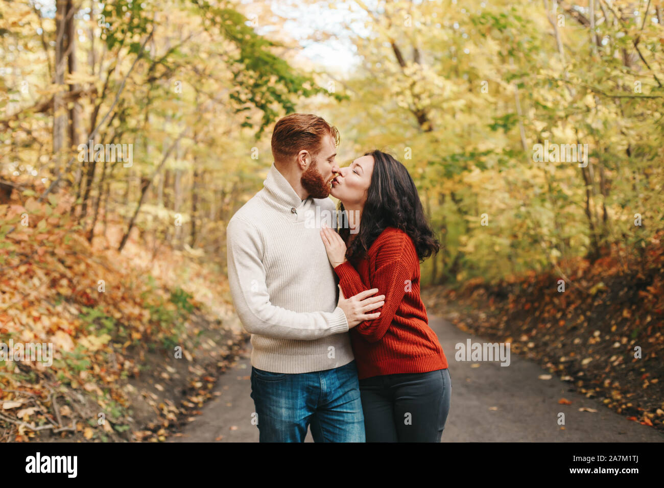 Portrait Of Beautiful Couple Man Woman In Love Boyfriend And Girlfriend Hugging Kissing Outdoor In Park On Autumn Fall Day Togetherness And Happines Stock Photo Alamy