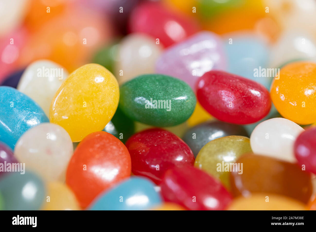 Macro closeup of brightly colored jellybeans - sweets or candy Stock Photo