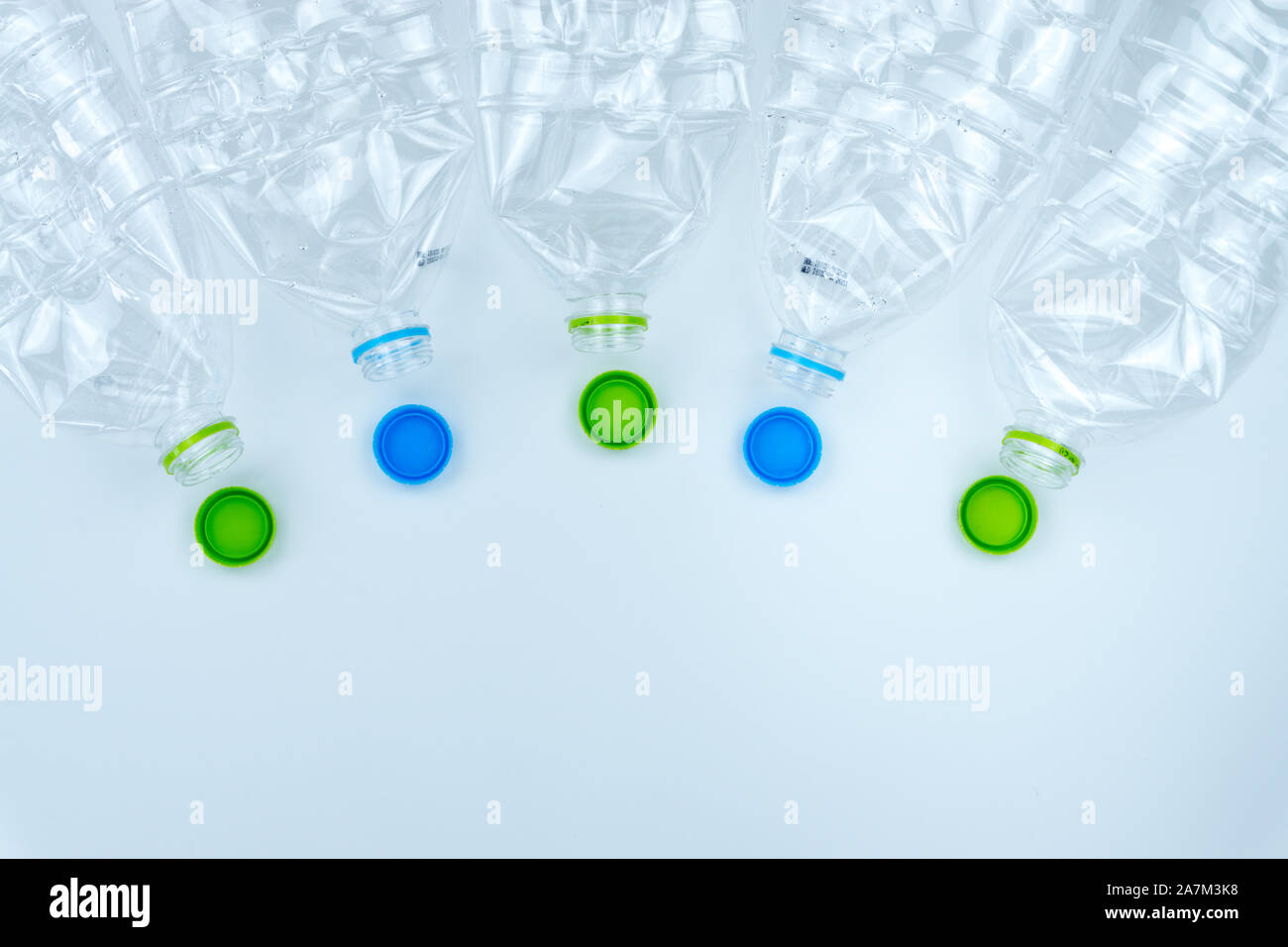Recycling. The frame of used plastic bottle on white background with copy space. Recycle and reuse concept Stock Photo