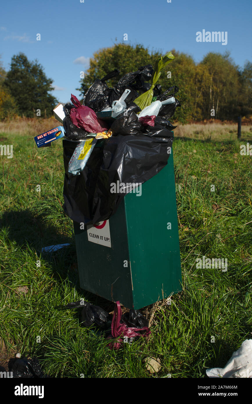 Overflowing Dog waste bin. South Staffordshire Stock Photo