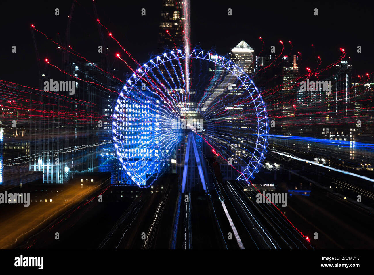 The London Eye and Canary Wharf photographed at night in-camera using  Intentional Camera Movement (ICM Stock Photo - Alamy