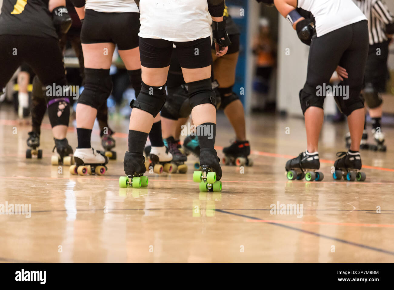 Roller derby players compete against each other Stock Photo Alamy
