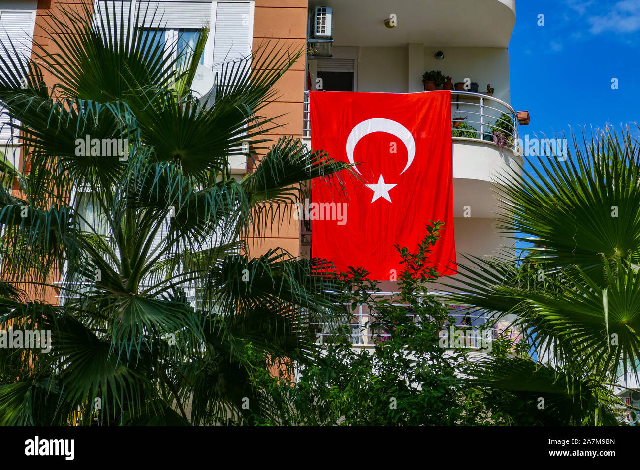 Turkish flag, Antalya, Konyaalti, Turkish holiday destination, Turkey, Turquoise Coast, Mediterranean Sea, Stock Photo