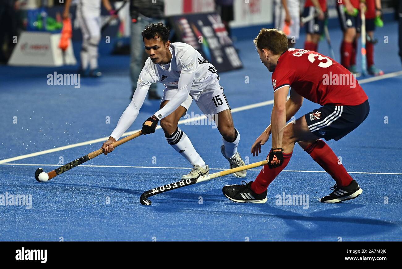 London, UK. 3rd Nov 2019. Nabil Noor (Malaysia) and Will Calnan (Great Britain). Great Britain v Malaysia. FIH Mens Olympic hockey qualifier. Lee Valley hockey and tennis centre. Stratford. London. United Kingdom. Credit Garry Bowden/Sport in Pictures/Alamy Live News. Stock Photo
