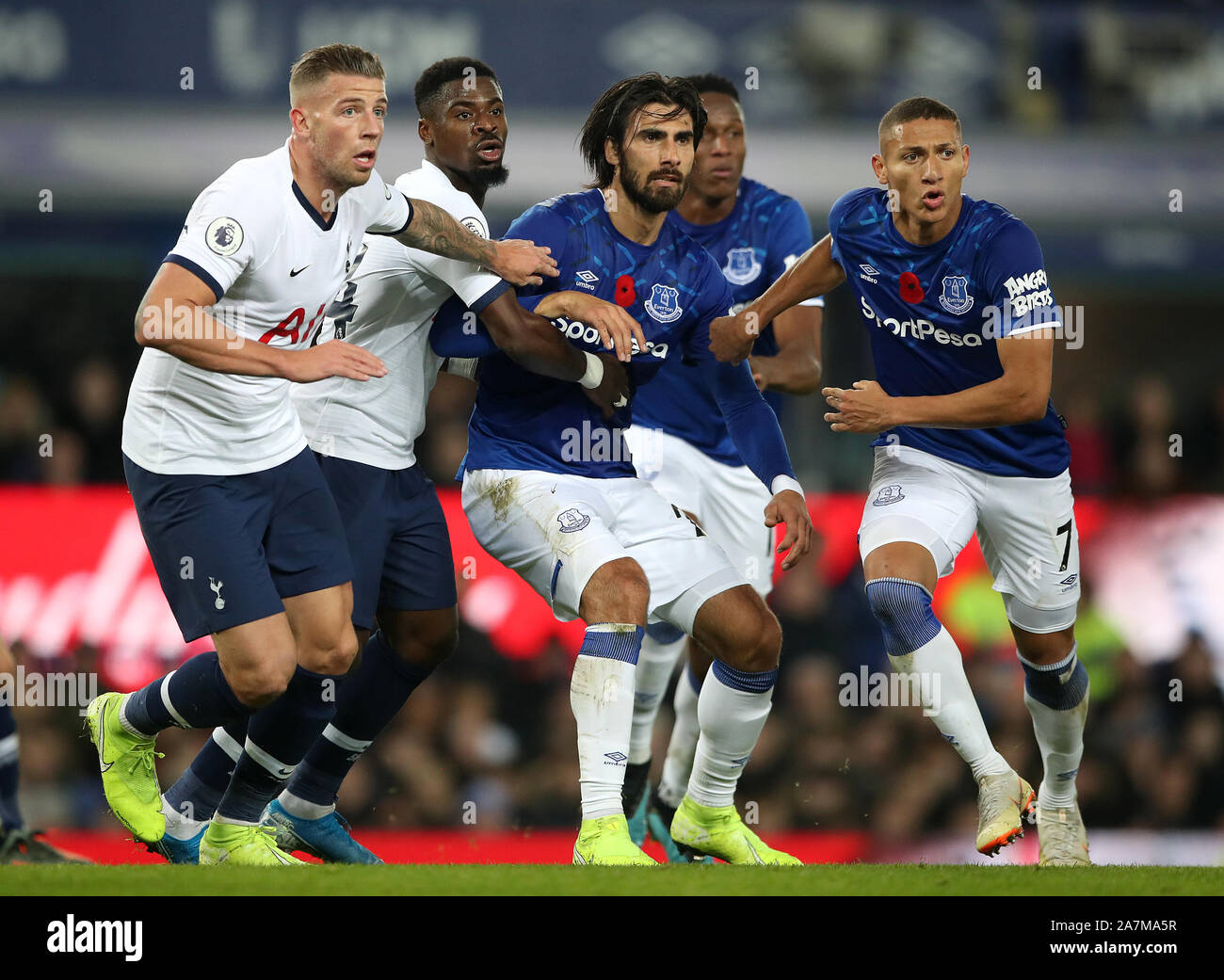 Tottenham Hotspur's Toby Alderweireld (left) and Serge Aurier battle with Everton's Andre Gomes (centre) and Richarlison during the Premier League match at Goodison Park, Liverpool. Stock Photo