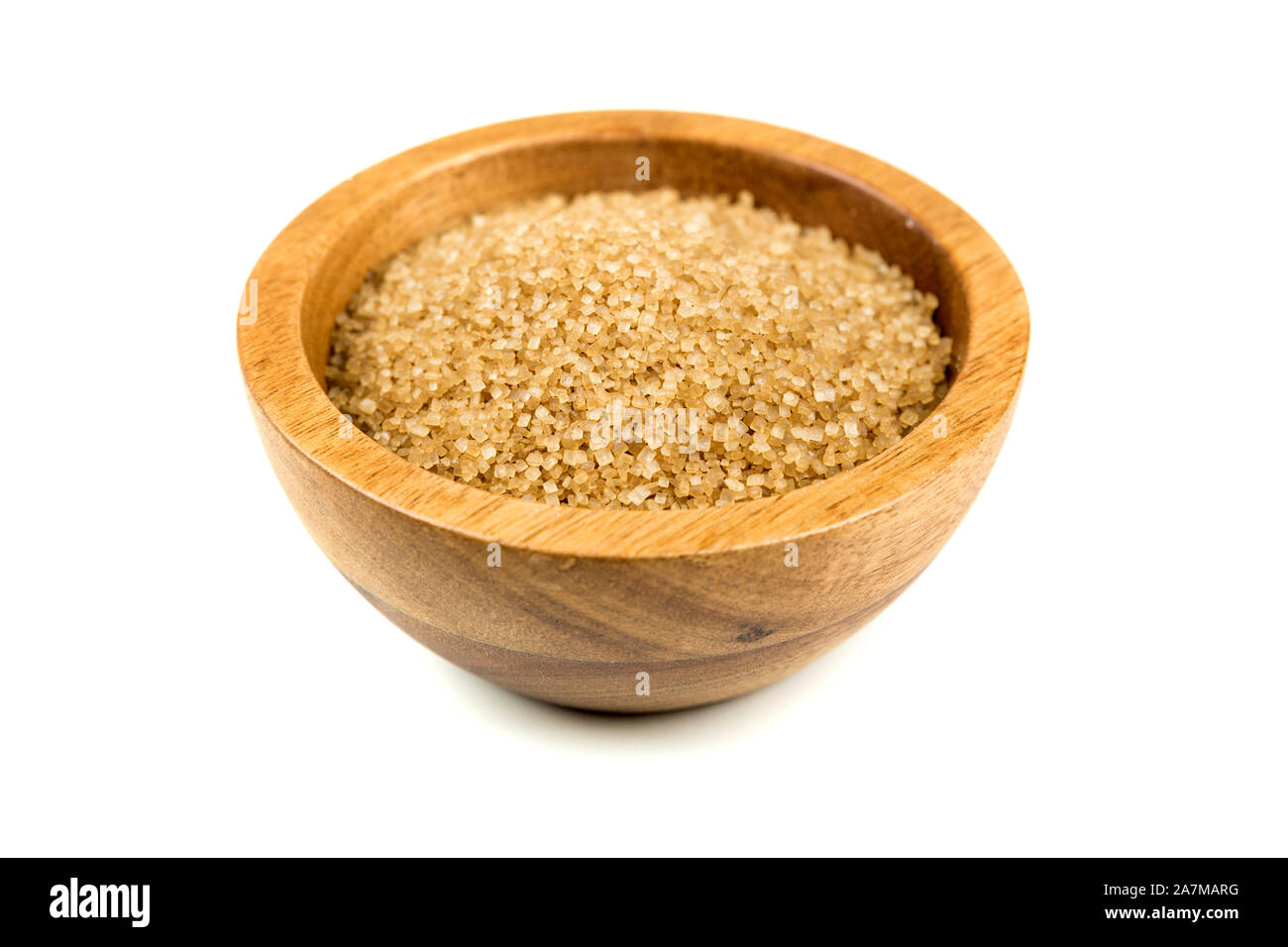 Scoop of raw cane sugar isolated over white Stock Photo Alamy