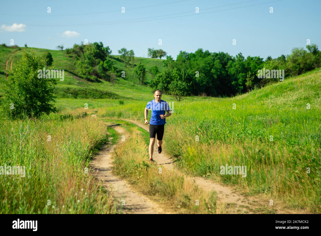 Trail jogger man outdoor in rural place Stock Photo