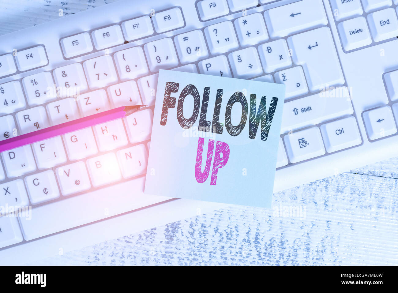 Writing note showing Follow Up. Business concept for a continuation of ...
