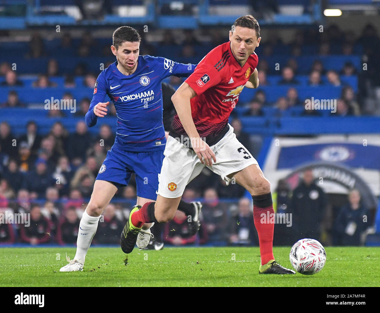 LONDON, ENGLAND - FEBRUARY 18, 2019: Jorge Luiz Frello Filho (Jorginho) of Chelsea and Nemanja Matic of Manchester pictured during the 2018/19 FA Cup Fifth Round game between Chelsea FC and Manchester United at Stamford Bridge. Stock Photo