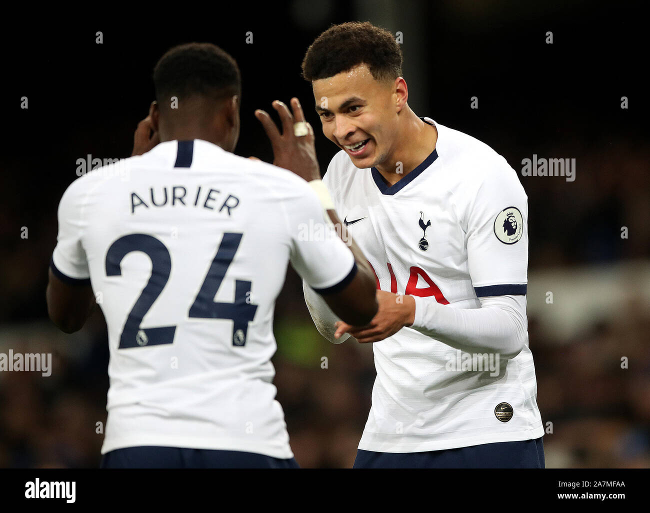 Tottenham Hotspur's Dele Alli (right) celebrates scoring his side's first goal of the game with Serge Aurier during the Premier League match at Goodison Park, Liverpool. Stock Photo