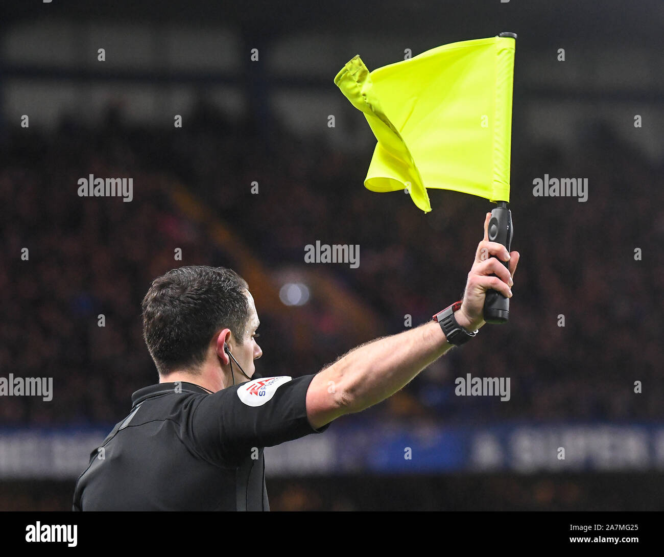 LONDON, ENGLAND - FEBRUARY 18, 2019: Assistant referee Edward Smart ...