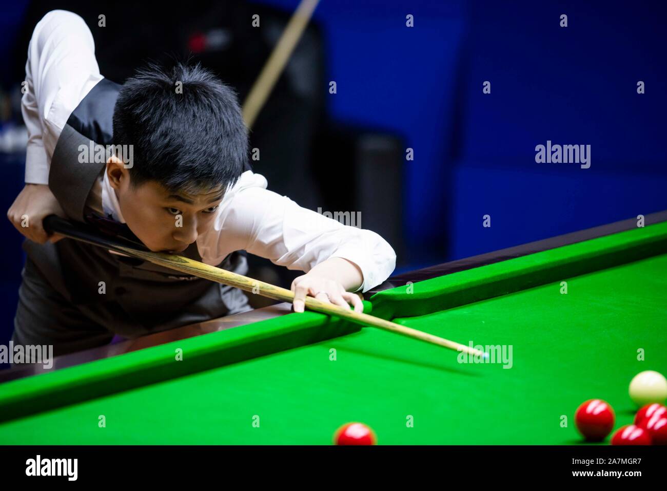 Chinese professional snooker player Wu Haotian plays a shot at the Round 1 of 2019 Snooker Shanghai Masters in Shanghai, China, 8 September 2019
