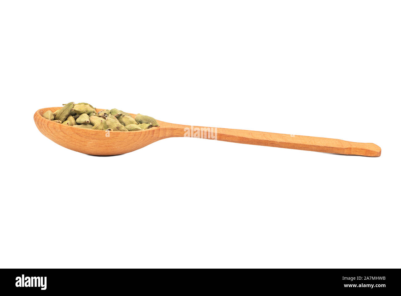 Large wooden spoon with dry cardamom isolated on white background Stock Photo