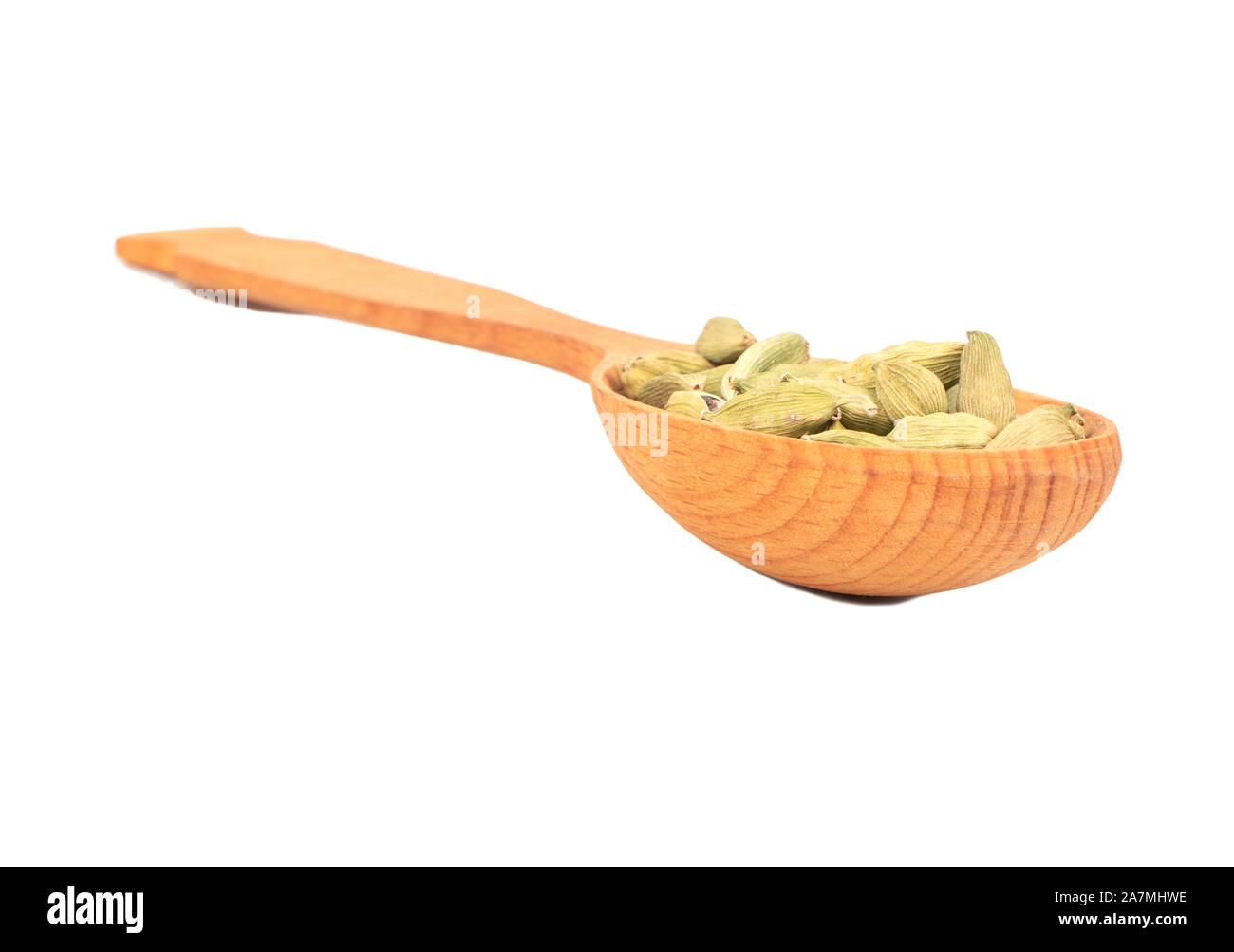 Large wooden spoon with dry cardamom isolated on white background Stock Photo