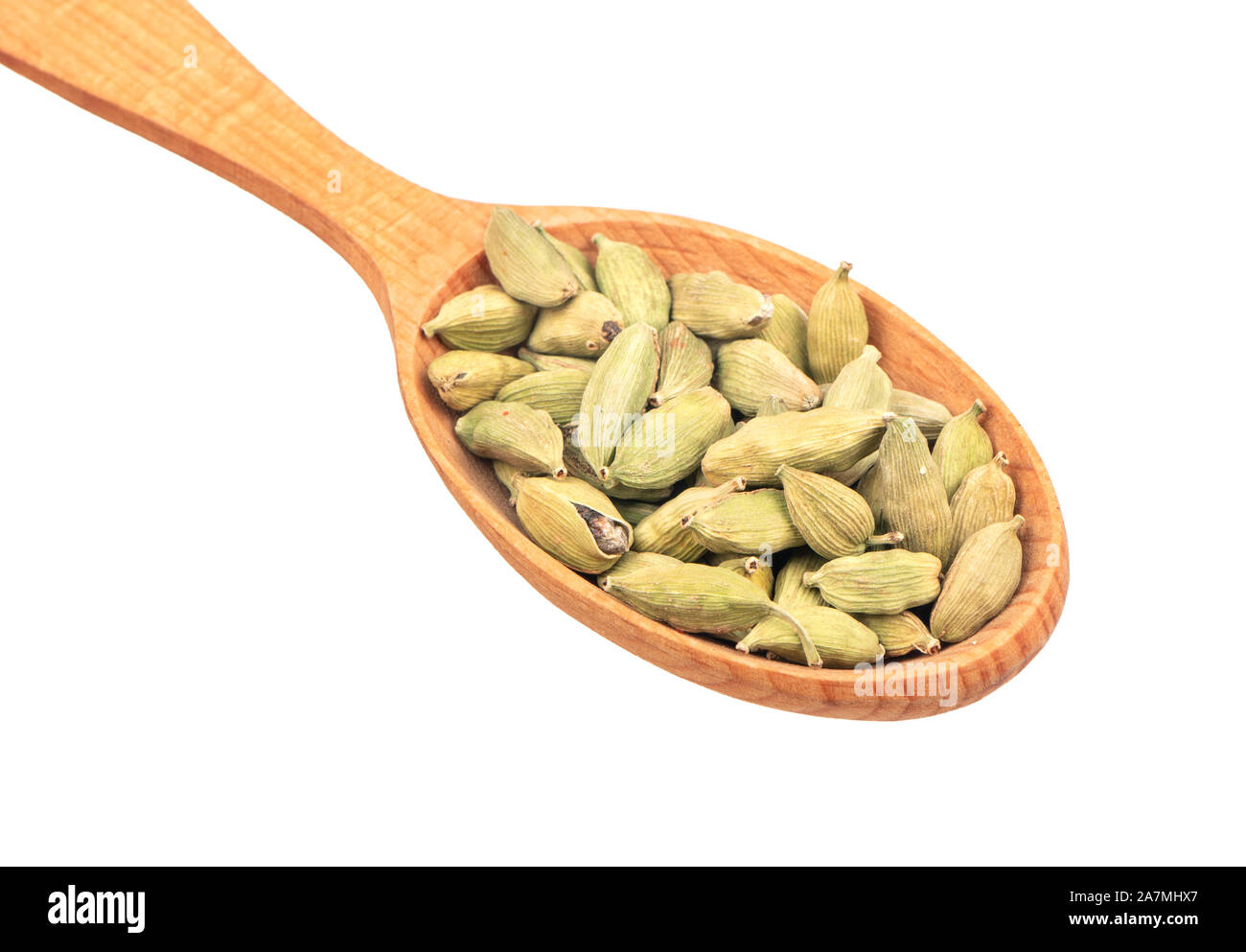 Large wooden spoon with dry cardamom isolated on white background closeup Stock Photo