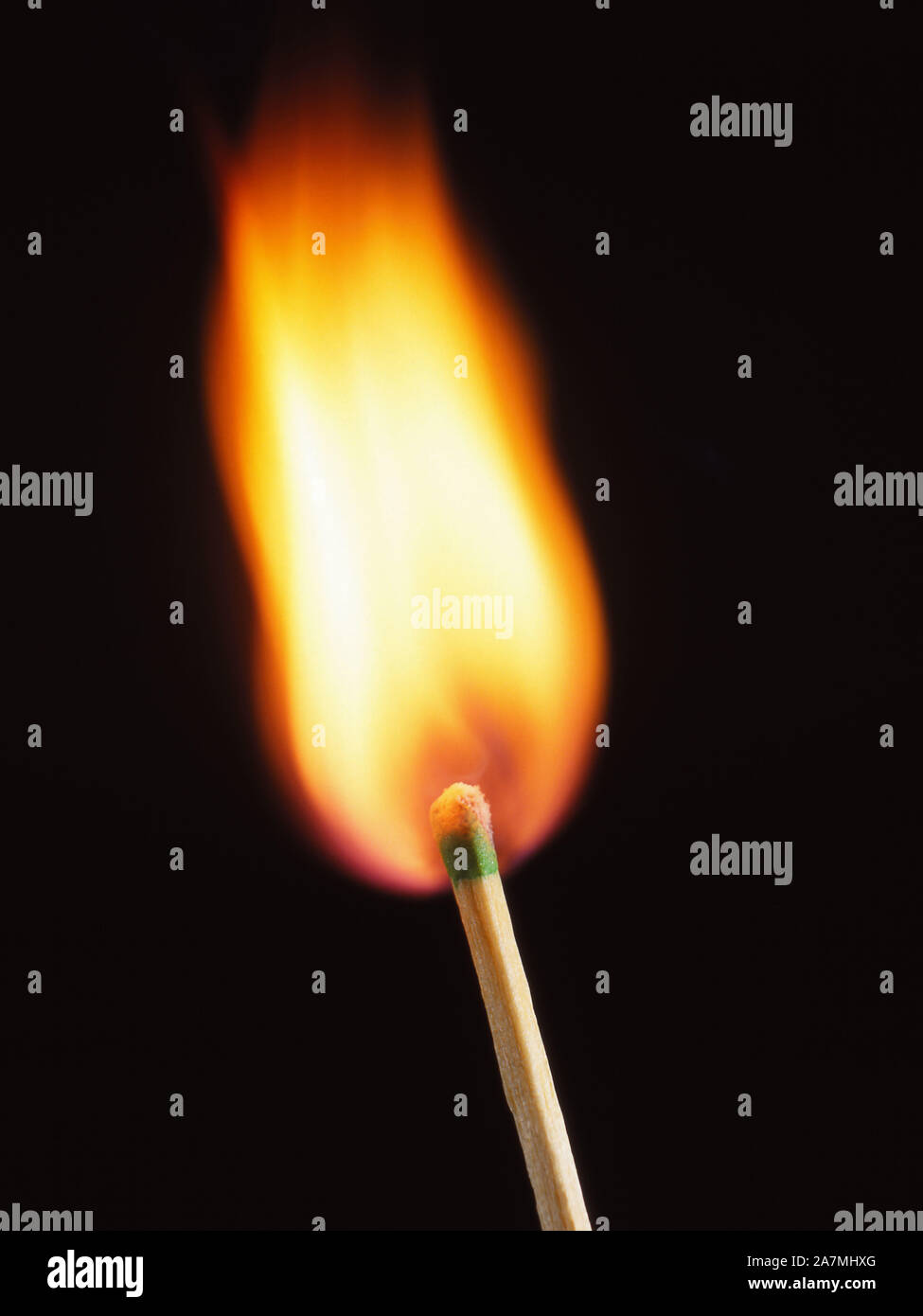Burning match with bright flame before black background Stock Photo - Alamy