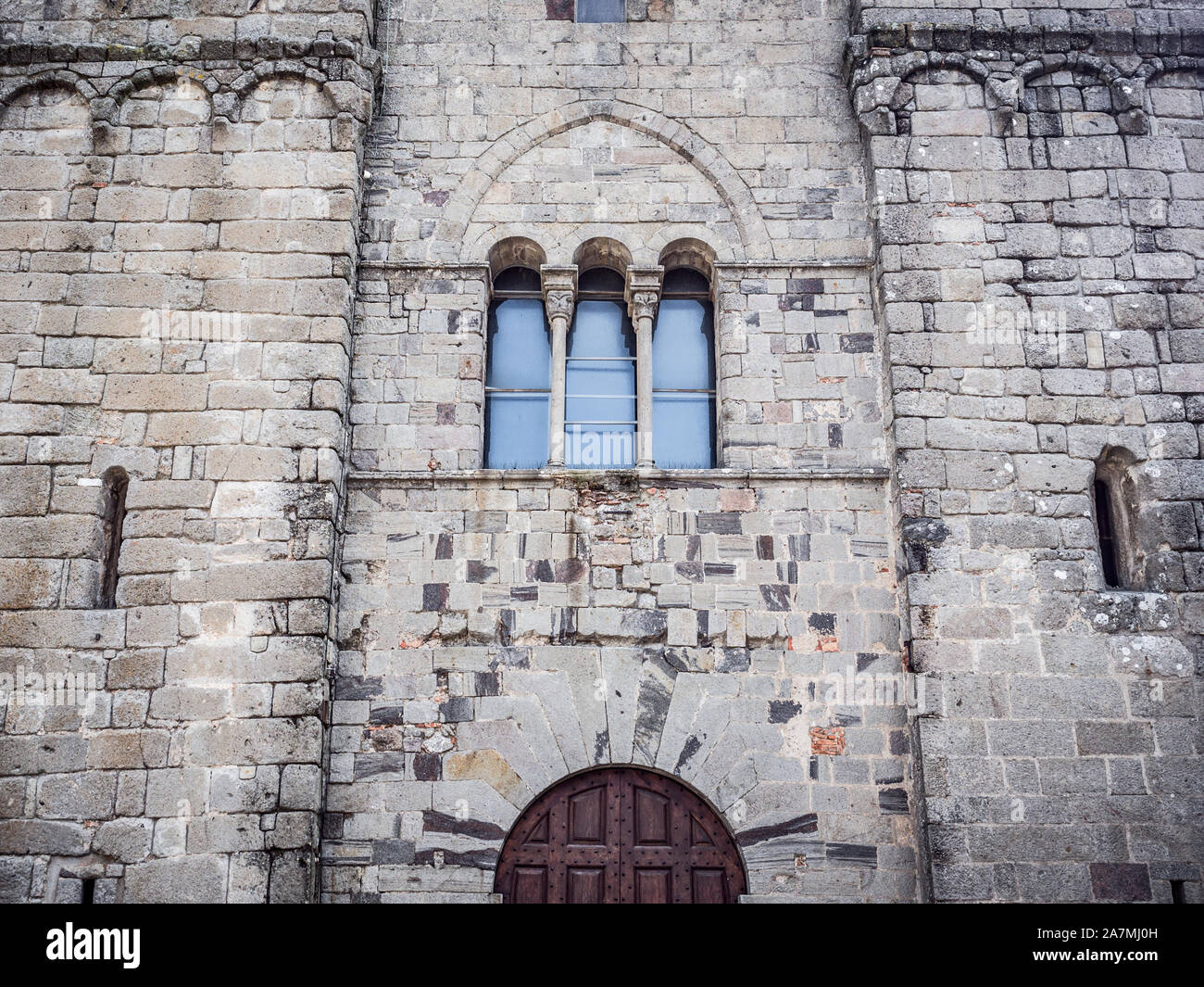 Triple lancet window of Italian medieval cathedral. Stock Photo