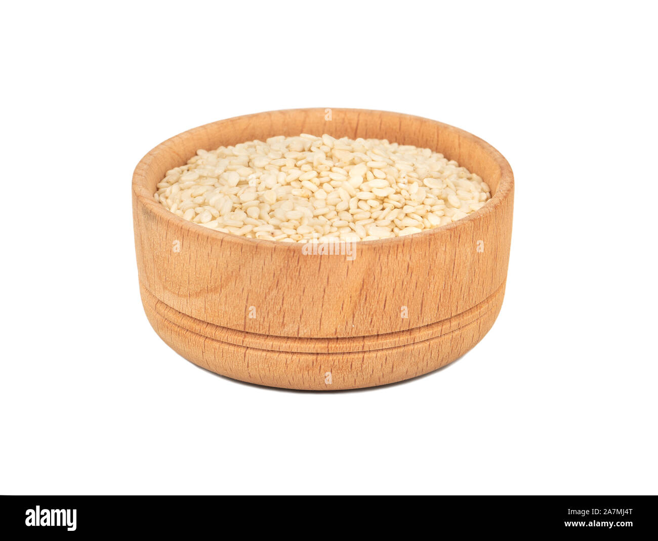 Sesame seeds in wooden bowl isolated on white background Stock Photo ...