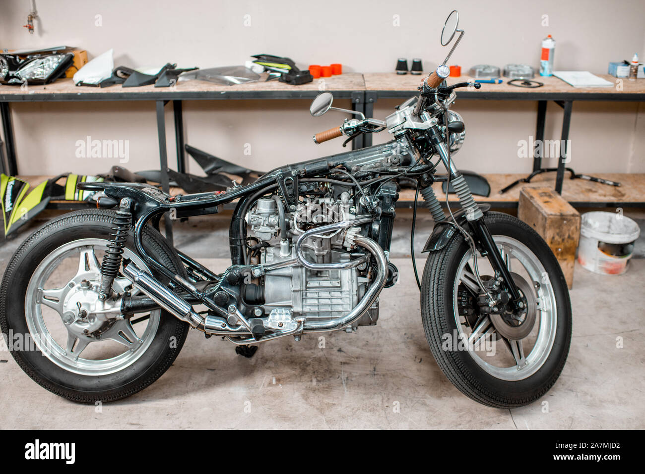 Beautiful vintage motorcycle during a repairment in the workshop Stock Photo