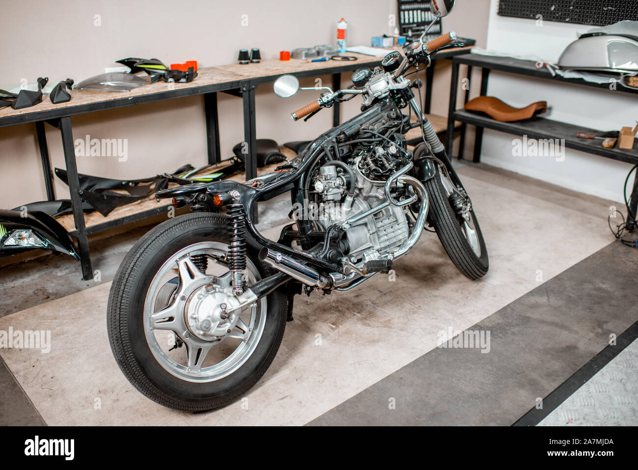 Beautiful vintage motorcycle during a repairment in the workshop Stock Photo