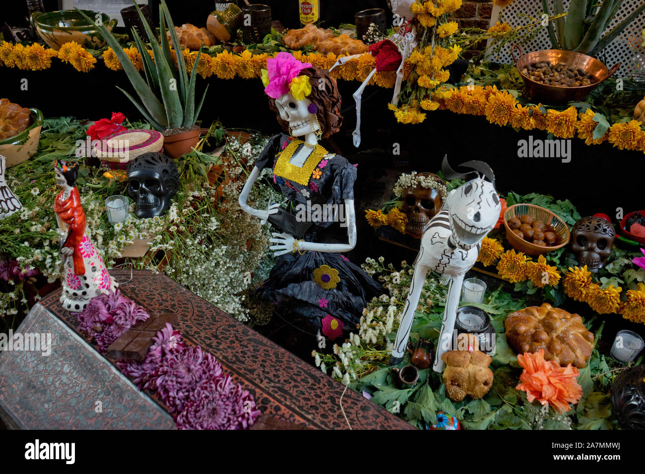 Traditional Day of the Dead (Dia de los Muertos) altar and banners in a ...