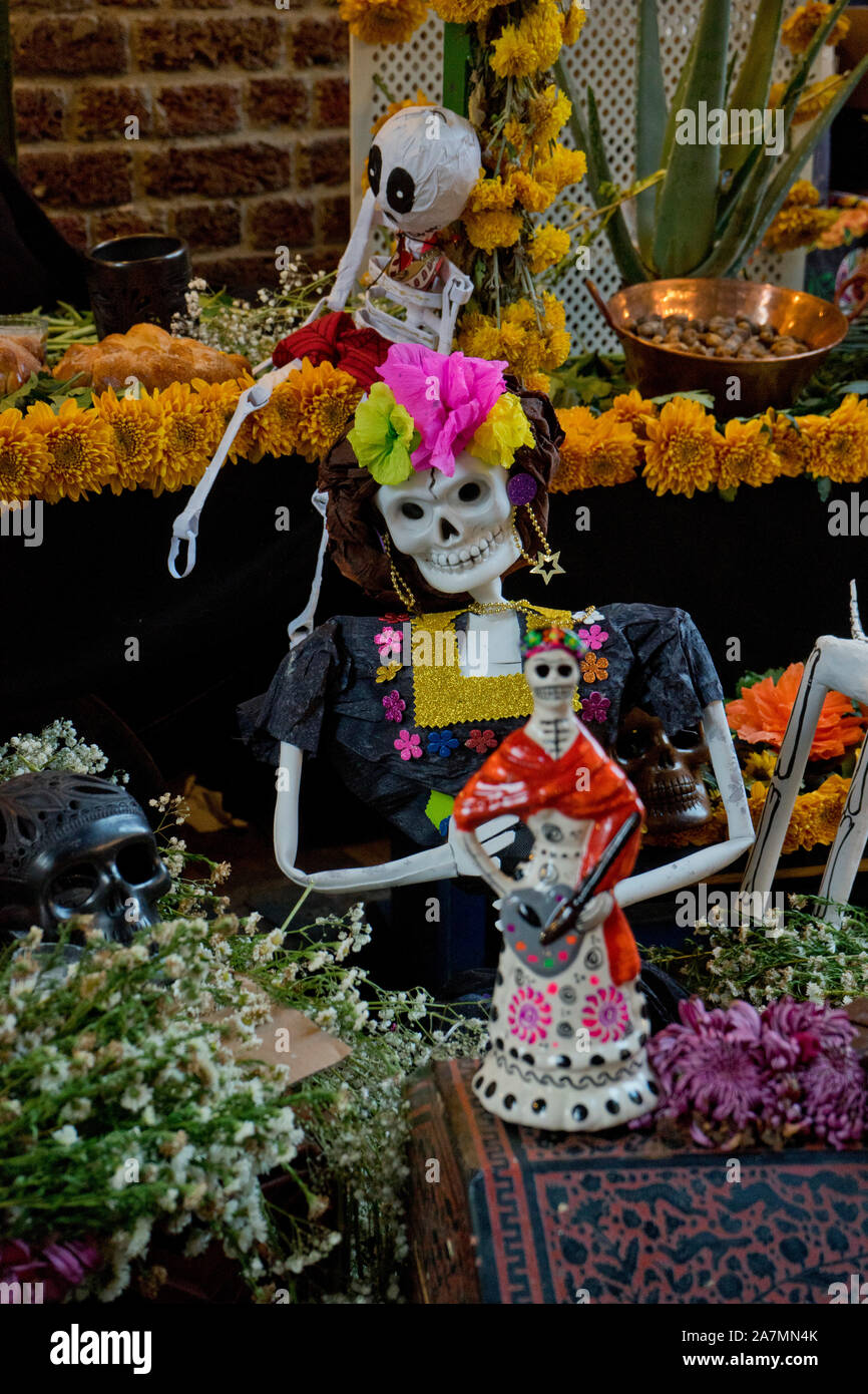 Traditional Day of the Dead (Dia de los Muertos) altar and banners in a ...