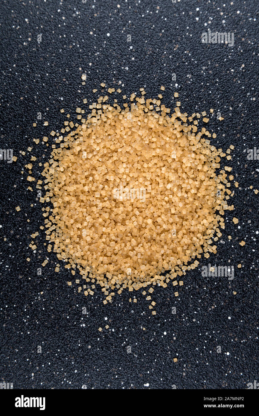 Cups of coarse crystalized demerara sugar Stock Photo