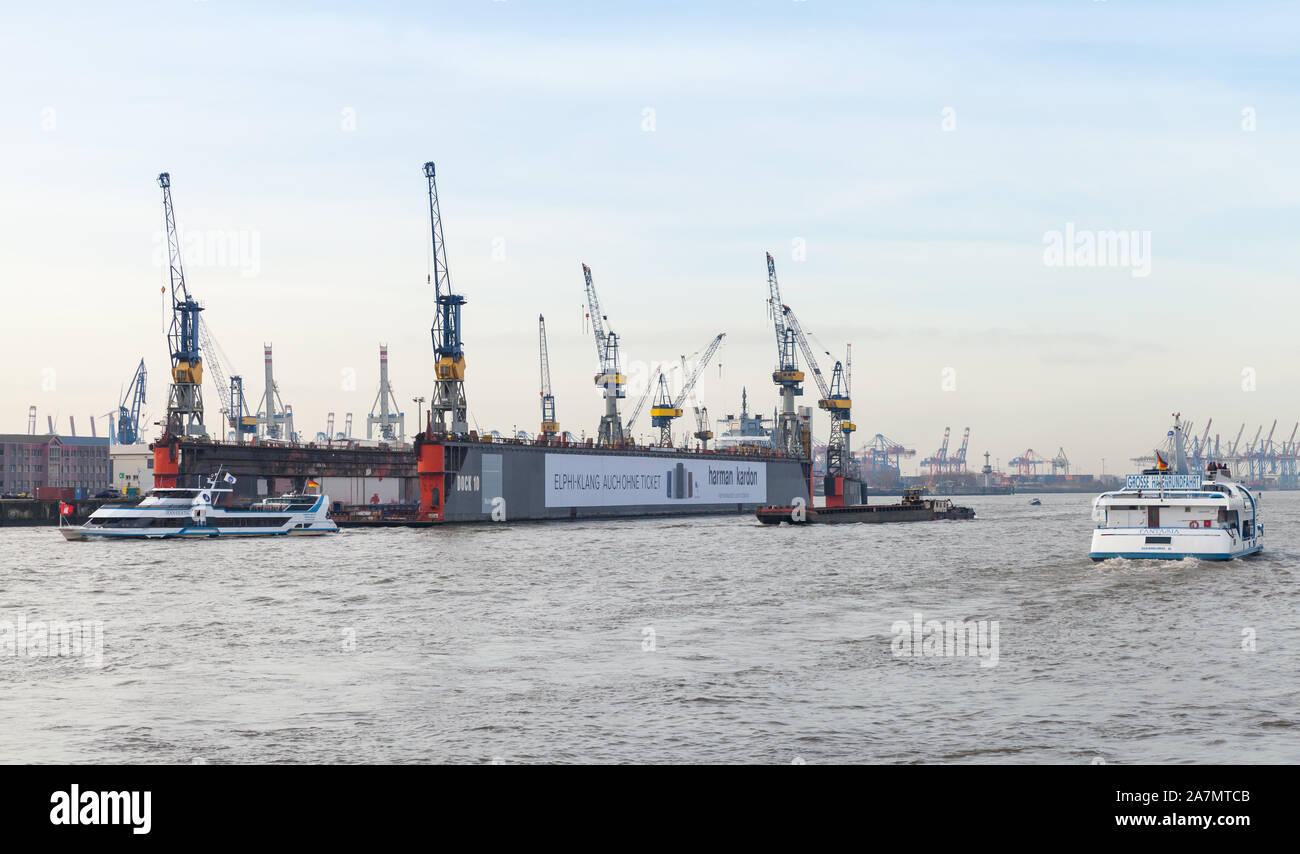 Hamburg, Germany - November 30, 2018: Floating dock 10 and ships are on the Elbe river in Hamburg port Stock Photo