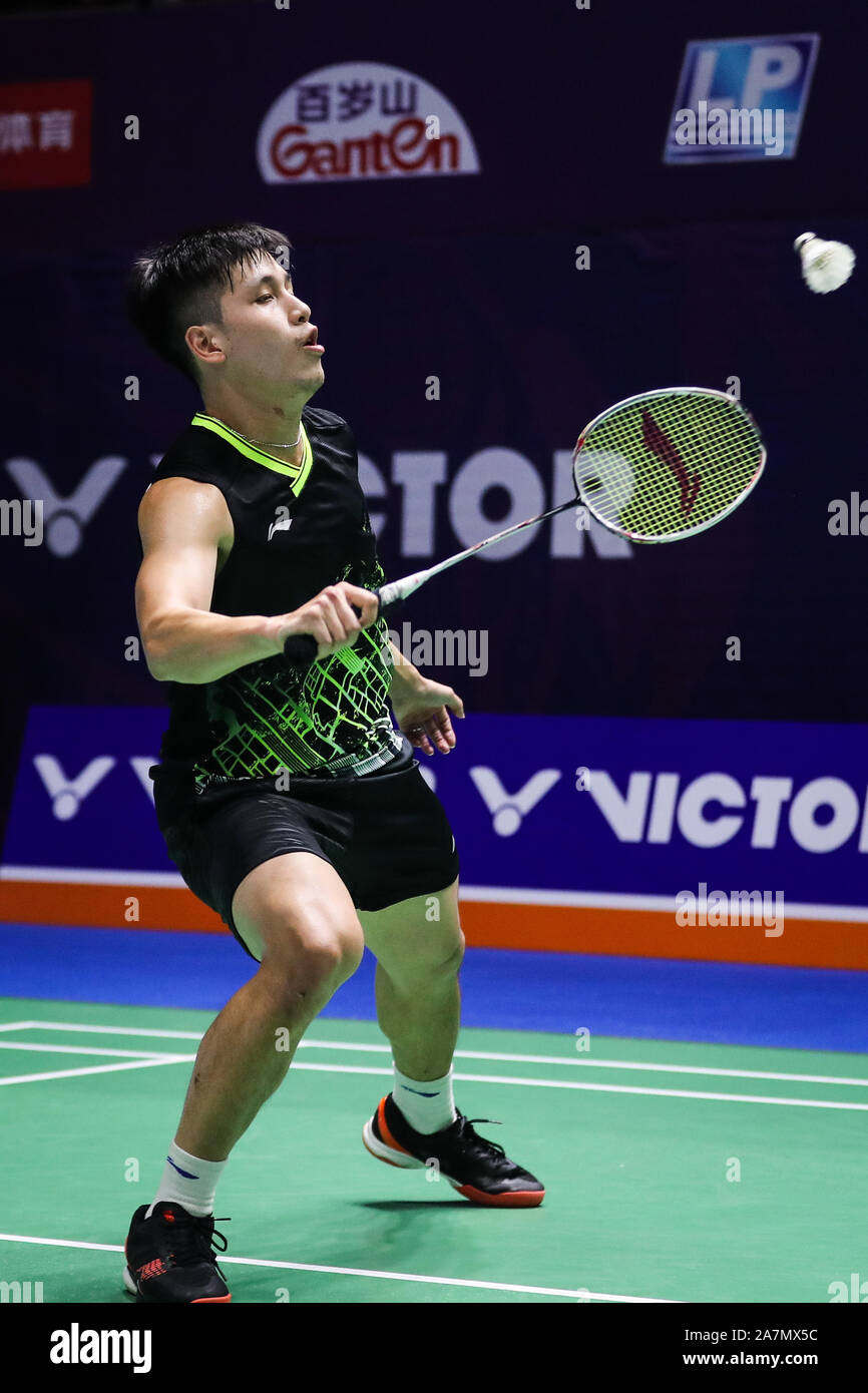 Indonesian professional badminton player Tommy Sugiarto competes against  Hong Kong professional badminton player Wong Wing Ki at the first round of  VI Stock Photo - Alamy