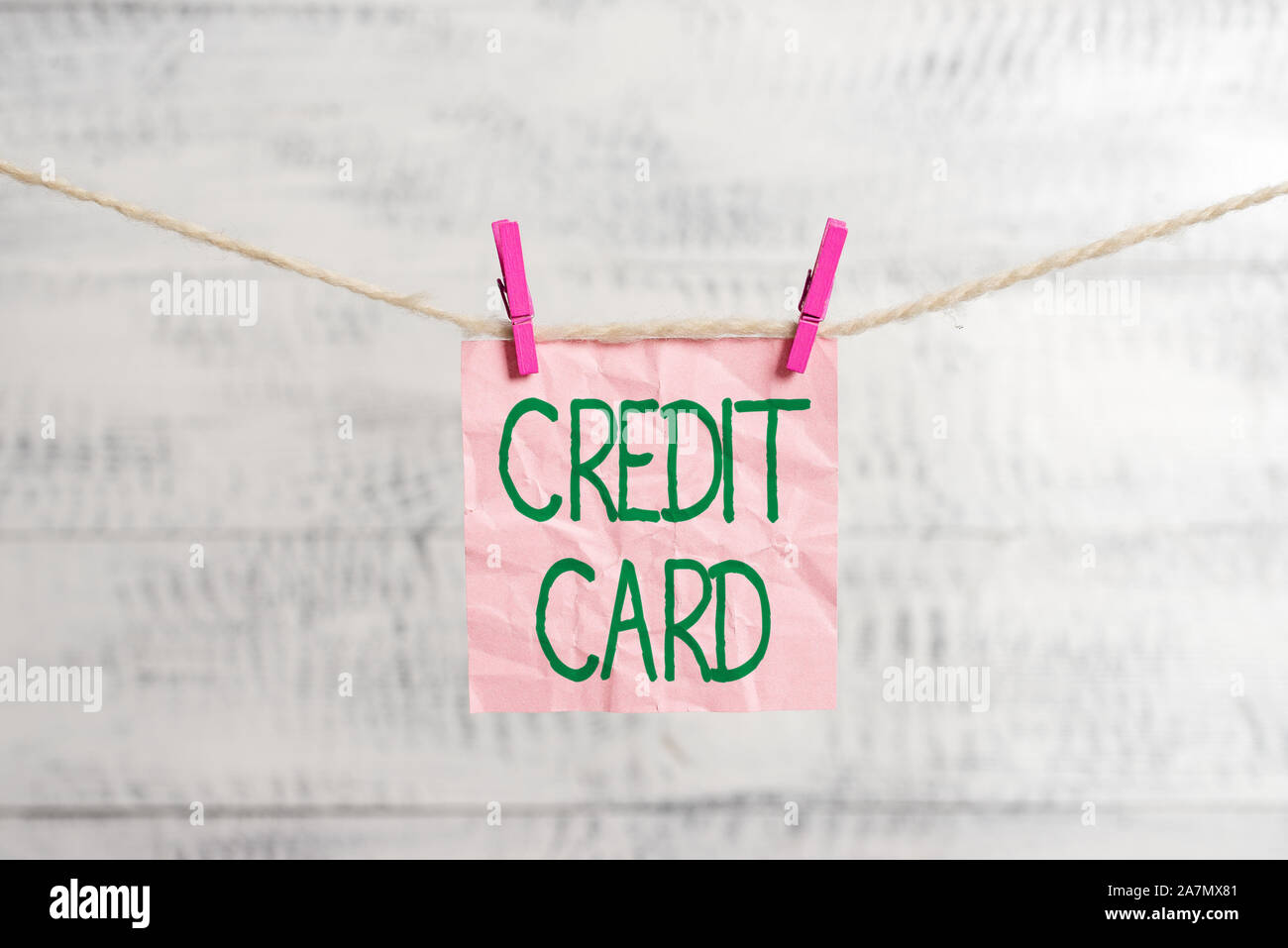Conceptual hand writing showing Credit Card. Concept meaning card that allows you to borrow money against a line of credit Clothespin rectangle shaped Stock Photo