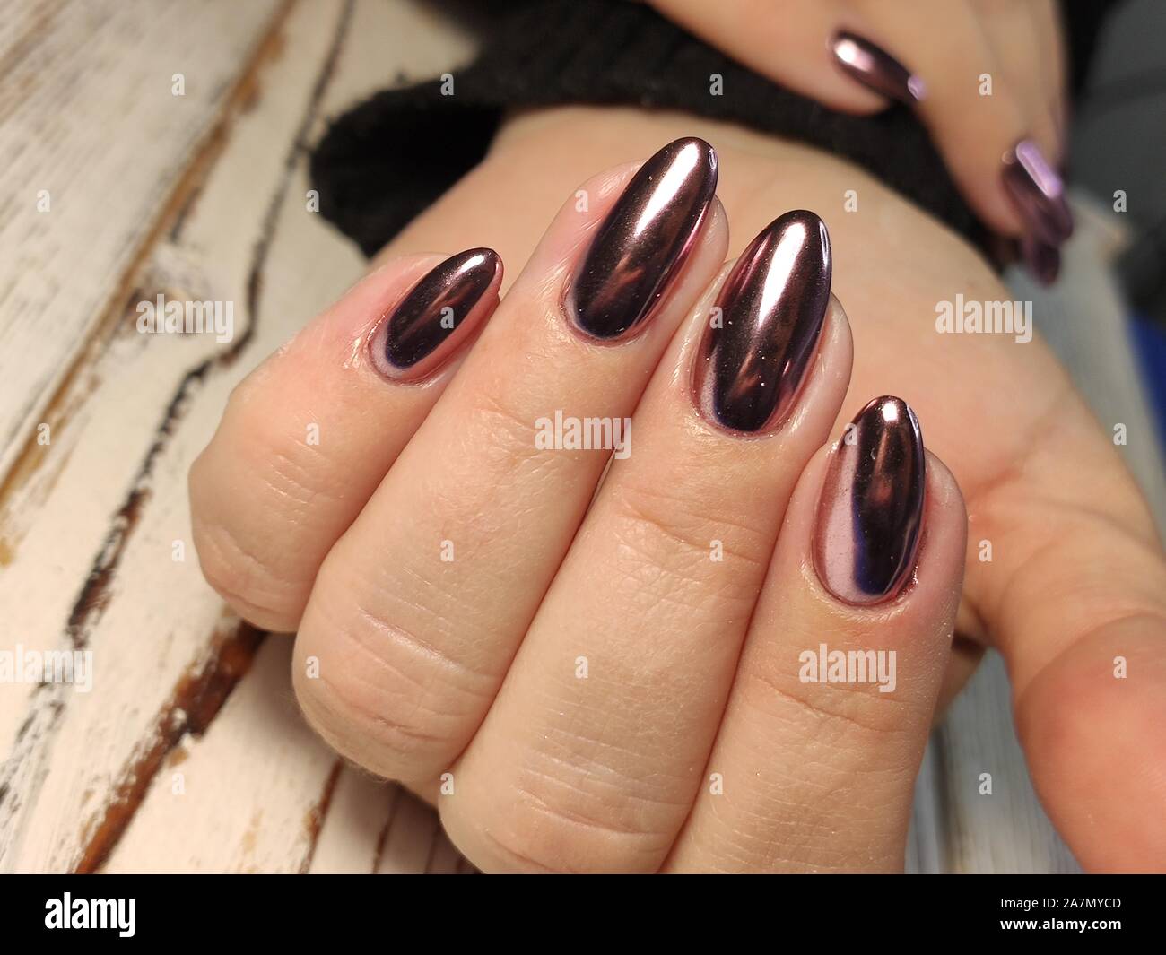 Gray striped nail design on female hand close up Stock Photo - Alamy