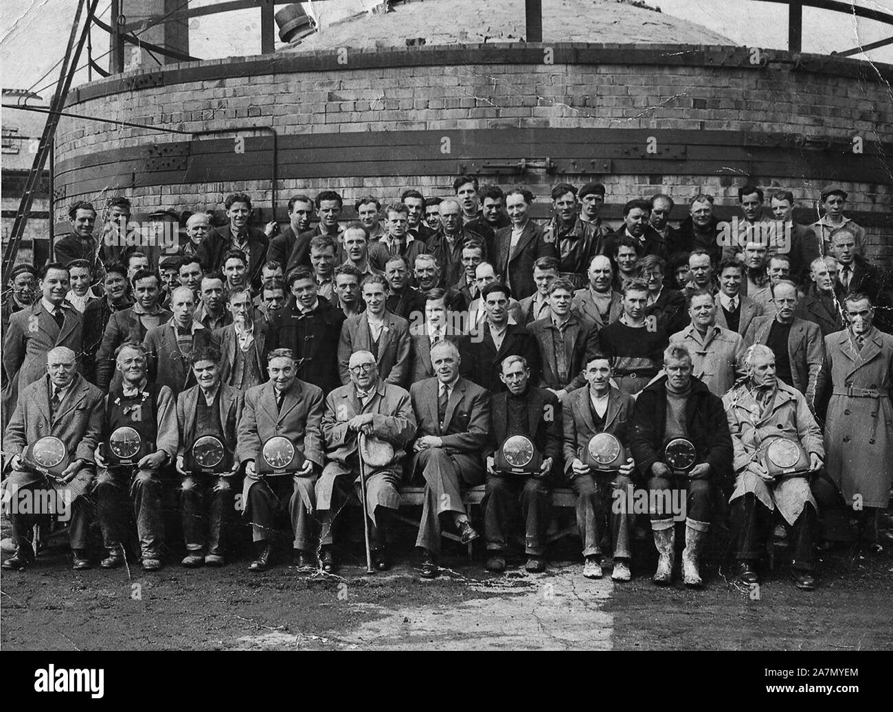 Workers long service staff group photograph Britain 1960 Doseley Pipe Works Stock Photo