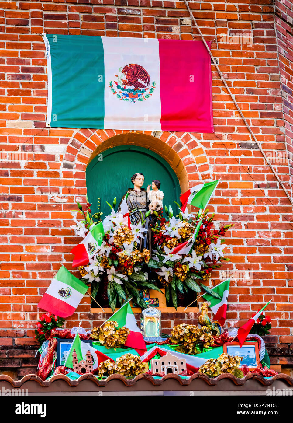 Mexican Market Square Flags Symbols Christmas Paper Decorations San Antonio Texas. San Antonio is very close to Mexico culturally with many Mexican re Stock Photo