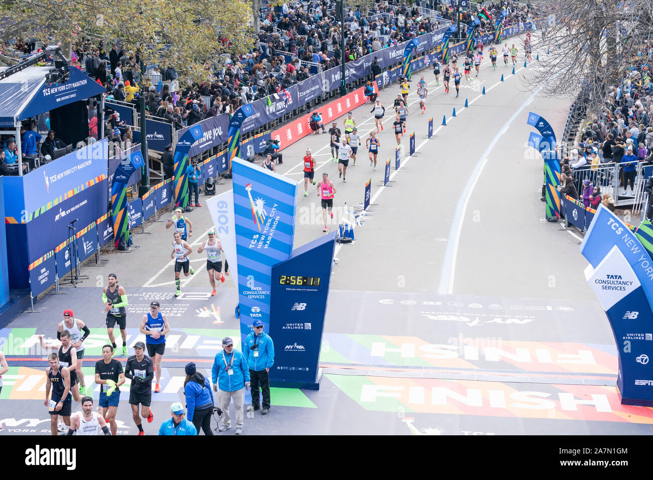 New York, NY - November 3, 2019: Runners at the finish line of New York City Marathon professional women division in Central PArk Stock Photo