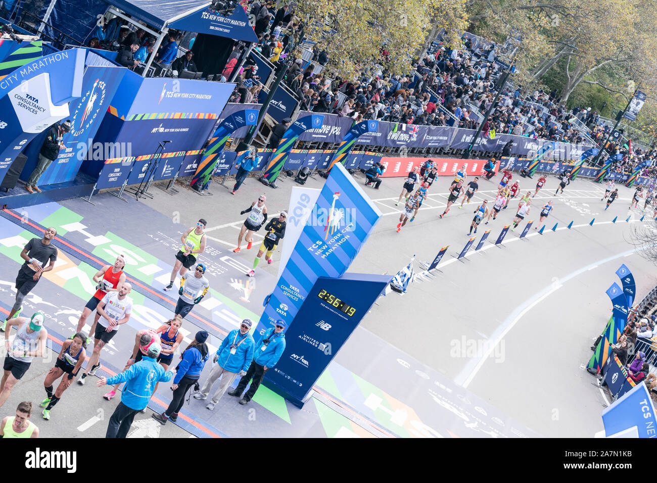 New York, NY - November 3, 2019: Runners at the finish line of New York City Marathon professional women division in Central PArk Stock Photo